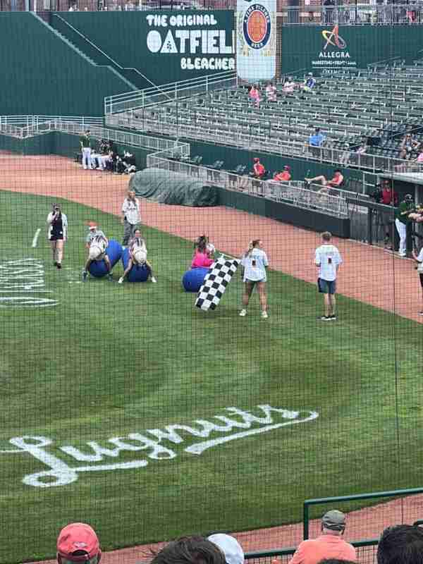 Children on the field at the Lansing Lugnuts game